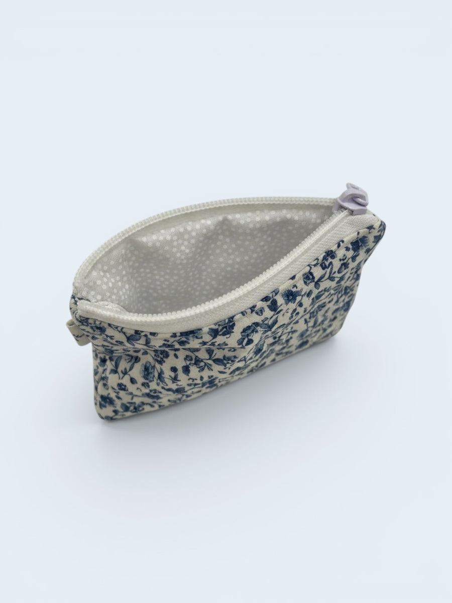 Blue Meadow quilted wallet, open, showing inside lining — handmade by The Cozy Daisy