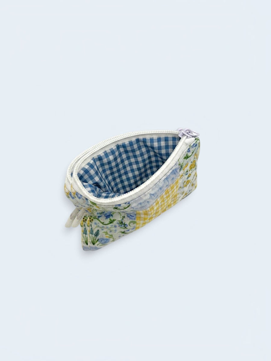 Patch of Spring quilted wallet, open, showing inside lining — handmade by The Cozy Daisy