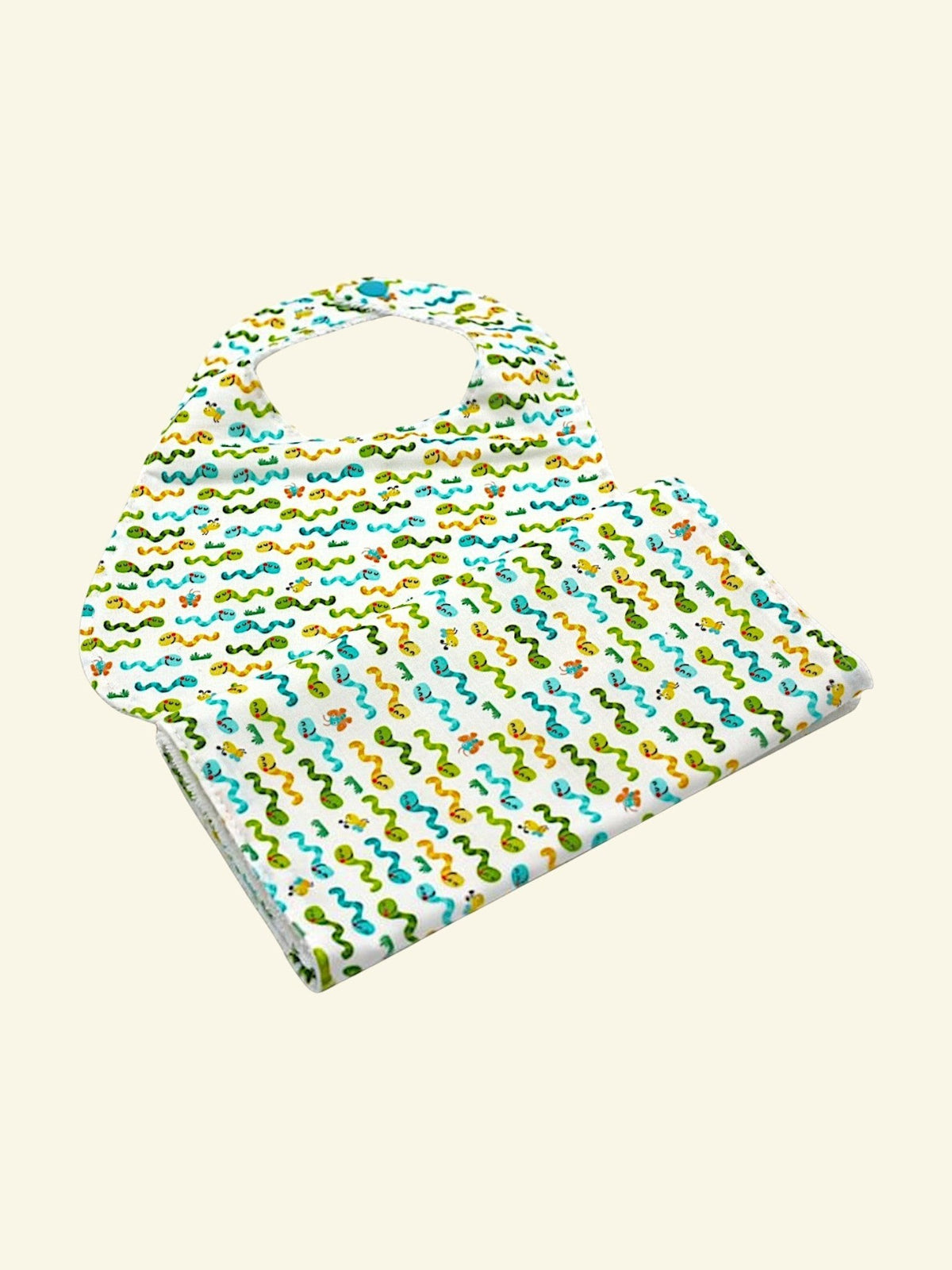 The Cozy Daisy handmade baby bib in a white cotton fabric featuring a colorful worms print with a snap closure.