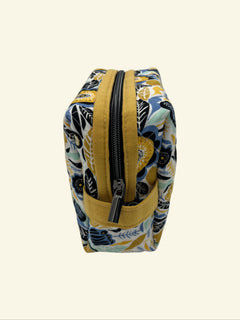 Blue and Gold Wildflower Holland pouch, end view showing the boxy shape and yellow carry handle — handmade by The Cozy Daisy