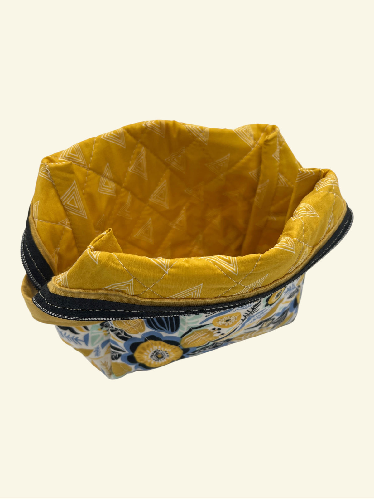 Blue and Gold Wildflower Holland pouch, open and showing the yellow patterned interior lining — handmade by The Cozy Daisy