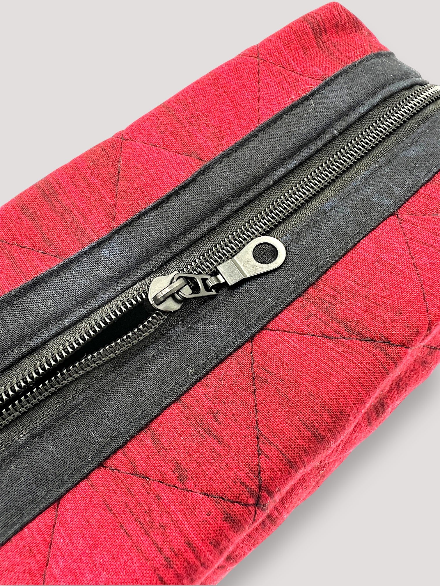 Distressed Ruby Holland pouch, close-up of the top zipper and quilted stitching — handmade by The Cozy Daisy