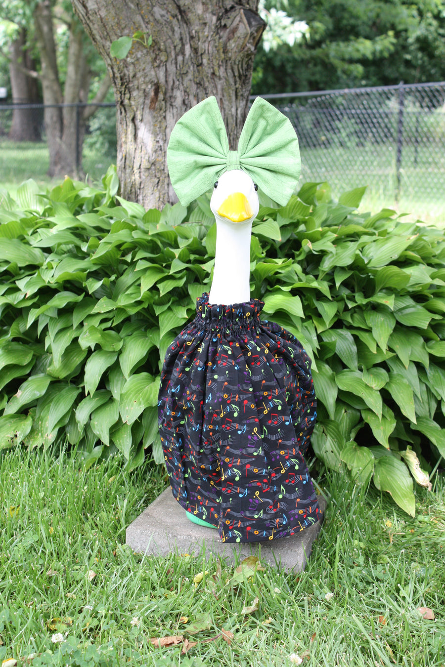 Musical Notes porch goose outfit, outside view — handmade by The Cozy Daisy