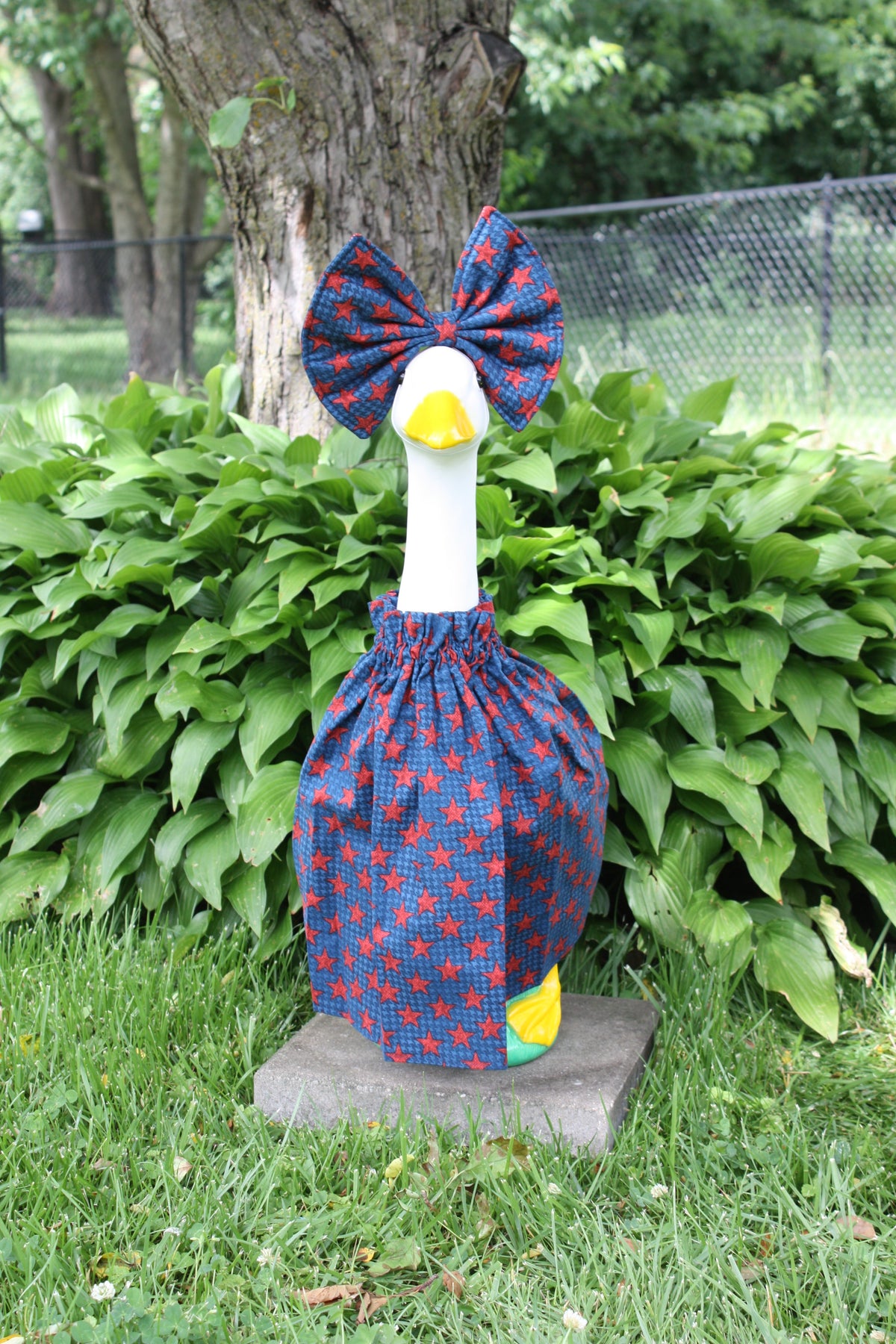 Blue & Red Stars porch goose outfit, outside view — handmade by The Cozy Daisy