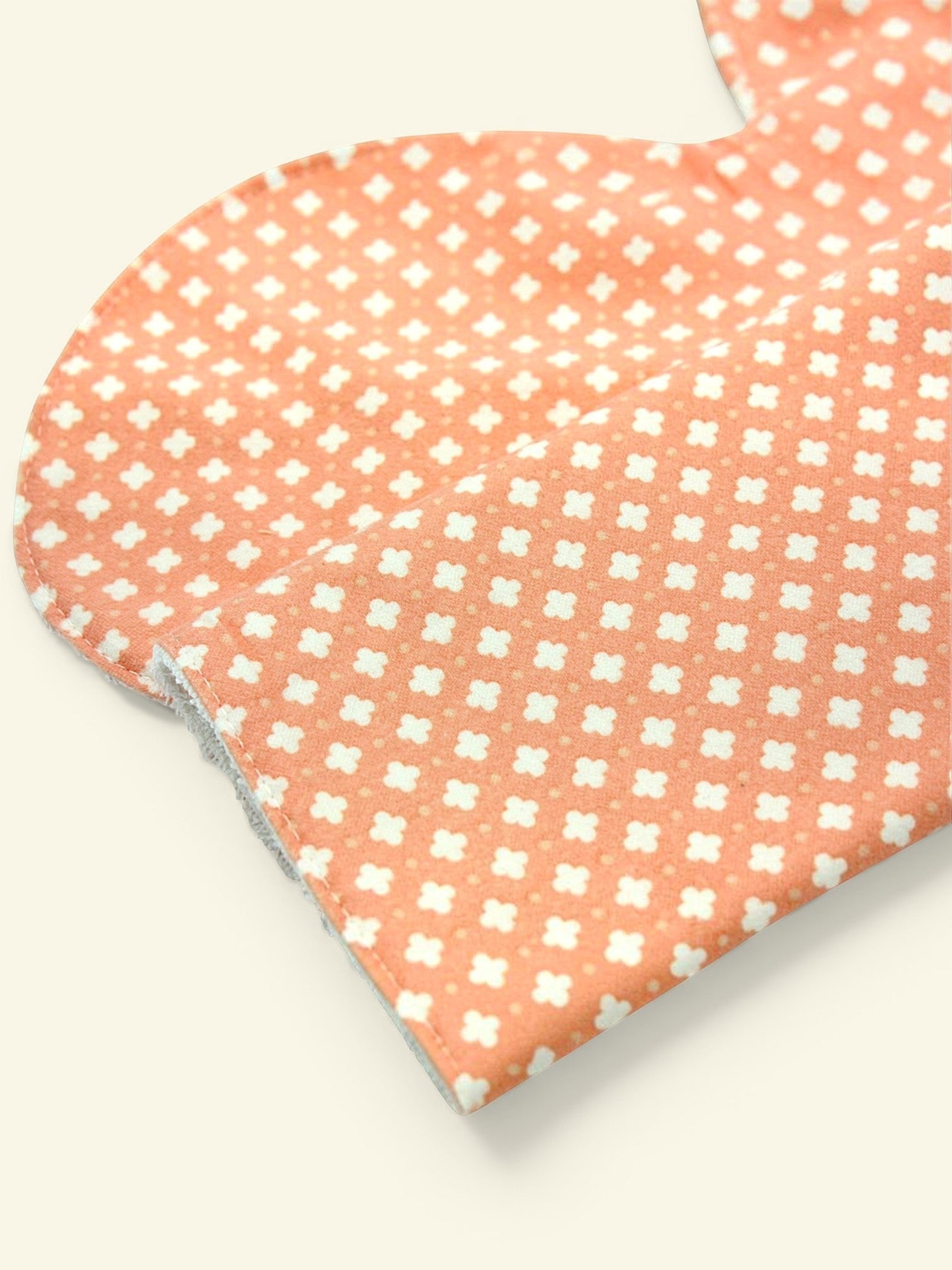 Peach burp cloth close-up
