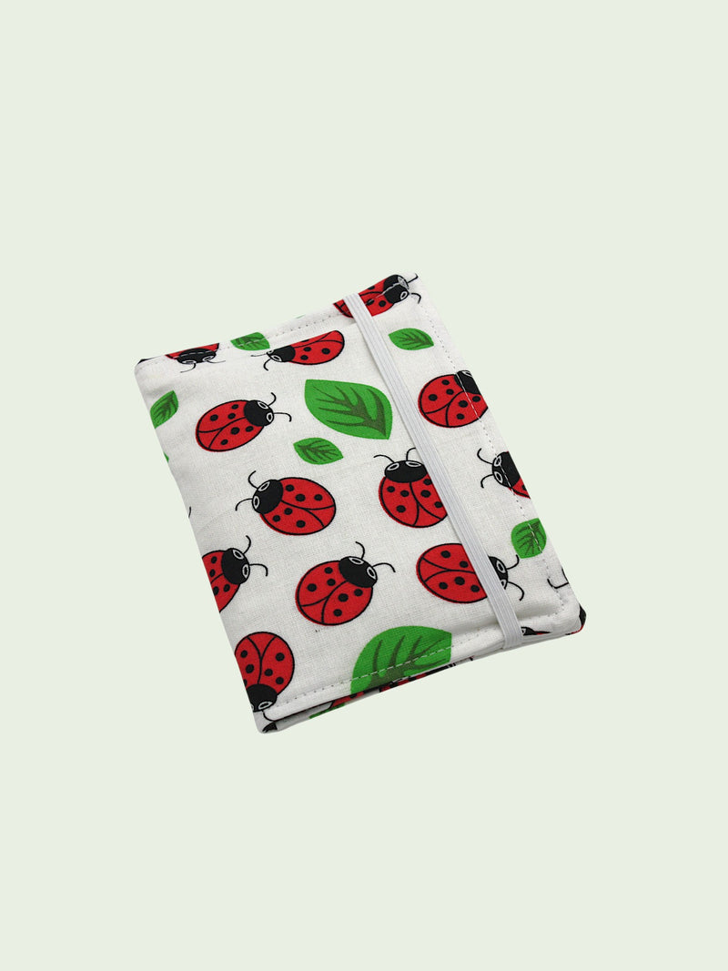 Crayon Wallet — Ladybug — outside