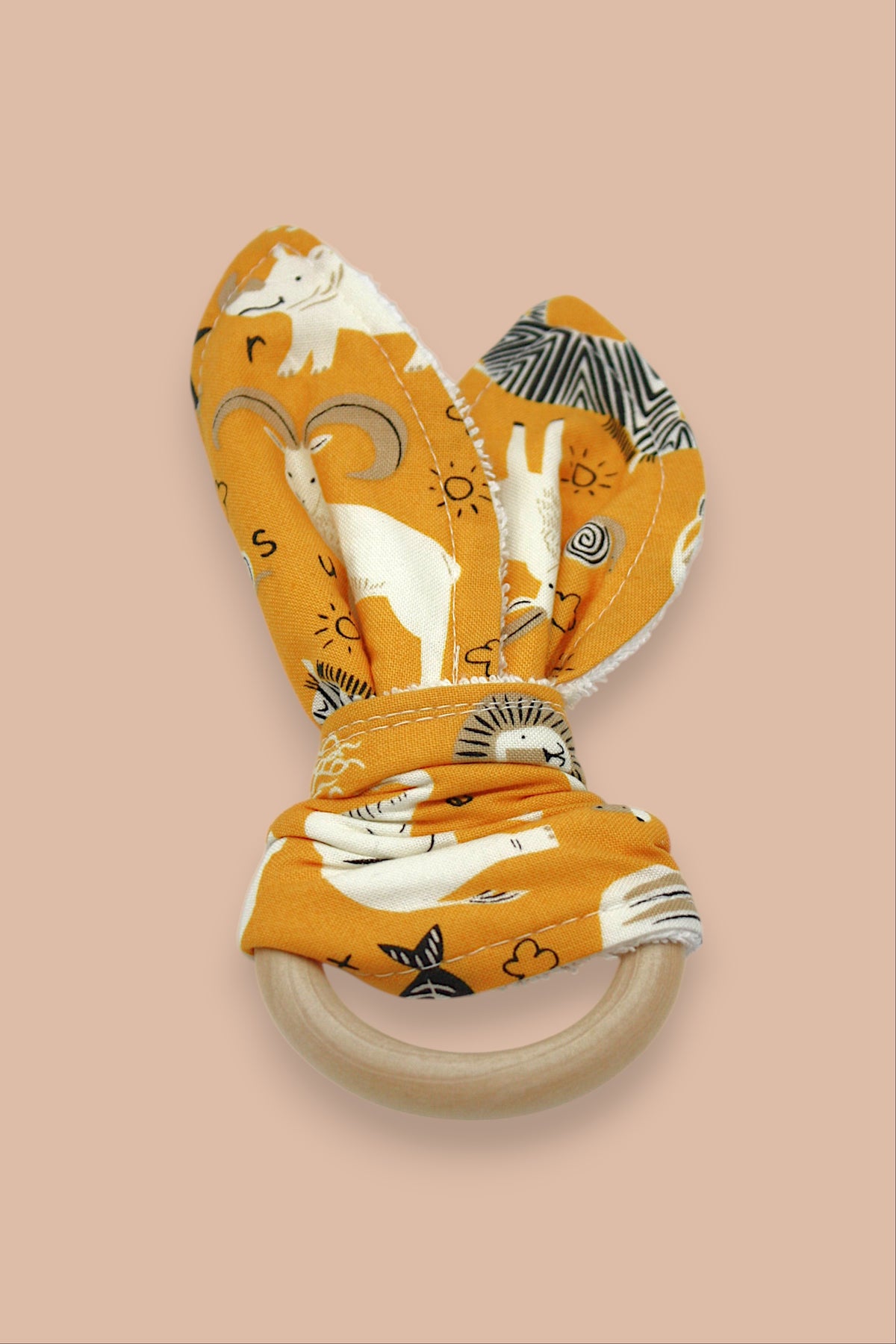 Teething Ring — Zoo Mustard — outside